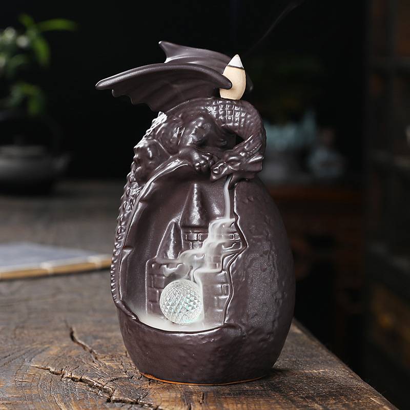 Egg-shaped Castle Winged Dragon Backflow Incense Burner with LED Light Ball