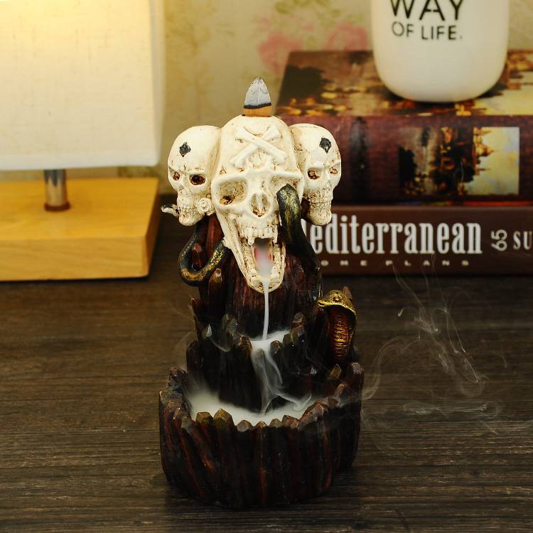 The Cobra Wound Around Skulls Backflow Incense Cone Burner